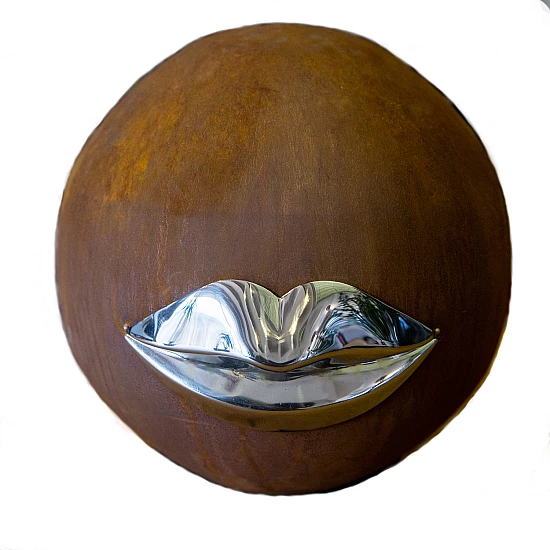 Sphere is decorative with lips on the stand Sphere is decorative with lips on the stand